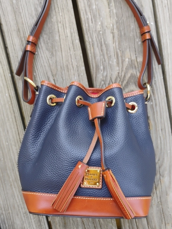 Dooney & Bourke Handbags - Dooney & Bourke Navy and Tan Pebble Leather Drawstring Bucket Shoulder Bag